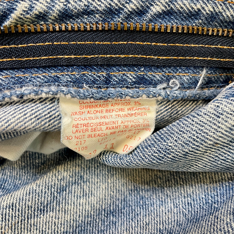 Vintage 80s Light Wash Distressed Orange Tab Levi's Made in Canada 32